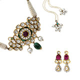 A SUITE OF RUBY AND 'POLKI' DIAMOND JEWELRY -    - Spring Auction of Jewels