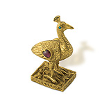 AN ENGRAVED GOLD AND GEM-SET 'PEACOCK' PAPERWEIGHT -    - Spring Auction of Jewels