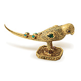 AN ENGRAVED GOLD AND GEM-SET 'PARROT' PAPERWEIGHT -    - Spring Auction of Jewels