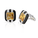 A PAIR OF TOPAZ AND ENAMEL CUFFLINKS -    - Fine Jewels and Objets d'Art