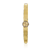 PIAGET: LADIES 18 K GOLD AND DIAMOND WRISTWATCH -    - Auction of Fine Jewels & Watches