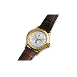 PATEK PHILIPPE: MENS `TRAVEL TIME` 18 K YELLOW GOLD WRISTWATCH, REF. 5134J -    - Auction of Fine Jewels and Watches