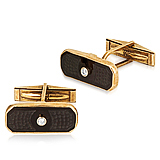 A PAIR OF ONYX AND DIAMOND CUFFLINKS -    - Auction of Fine Jewels & Watches