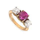 A RUBY AND DIAMOND THREE-STONE RING -    - Auction of Fine Jewels & Watches