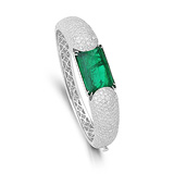 A REGAL EMERALD AND DIAMOND BANGLE -    - Auction of Fine Jewels & Watches
