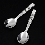 A SET OF 'SCROLL' PATTERN SALAD SERVERS BY JOHAN ROHDE, GEORG JENSEN -    - Travel and Leisure Auction