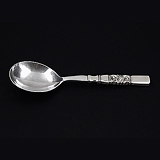 A 'SCROLL' PATTERN SERVING SPOON BY JOHAN ROHDE, GEORG JENSEN -    - Travel and Leisure Auction