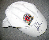 A CAP SIGNED BY TIGER WOODS -    - Travel and Leisure Auction