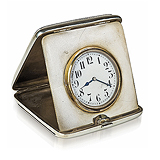 A STERLING SILVER AND LEATHER TRAVEL CLOCK -    - Travel and Leisure Auction