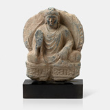 GREY SCHIST FIGURE OF SEATED BUDDHA IN ABHAYA MUDRA -    - Live Auction: South Asian Treasures