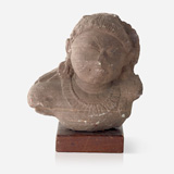 A RED SANDSTONE BUST OF A WOMAN -    - Live Auction: South Asian Treasures