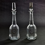 A PAIR OF MONOGRAMMED CRYSTAL DECANTERS -    - LIVE Auction Celebrating 20th Century Design