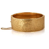 A GOLD BANGLE -    - Online Auction of Fine Jewels and Silver