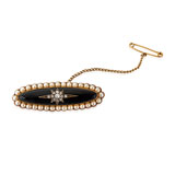 A BLACK ONYX AND PEARL BROOCH -    - Online Auction of Fine Jewels and Silver