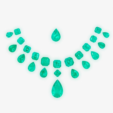 A SUITE OF UNMOUNTED EMERALDS