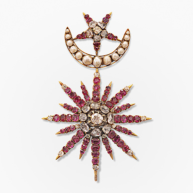 AN EXCEPTIONAL RUBY AND DIAMOND BROOCH