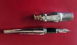 LIMITED EDITION STERLING SILVER `PANTHER` PEN BY CARTIER -    - The Collector`s Eye