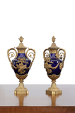 A pair of Louis XVI style French Vases in the "Bleu De Sevres" -    - The Design Sale